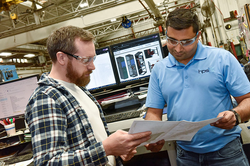 two employees review document